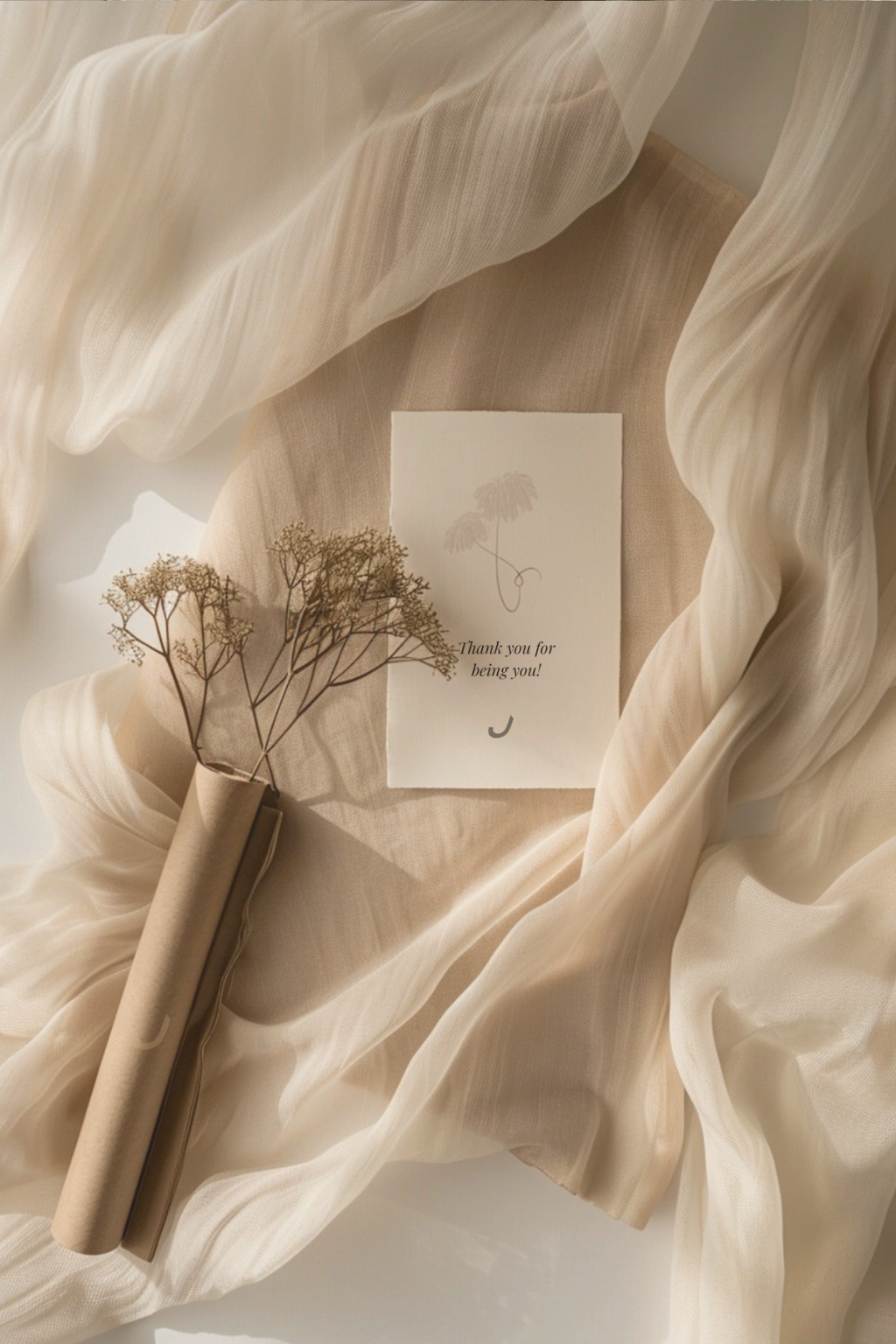 THINKER Fine Art Giclée Print packaging concept — rolled in kraft tube with delicate tissue wrap and card, styled with soft fabric and dried florals.